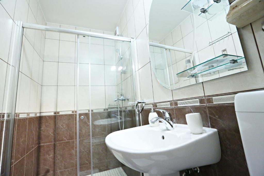 Apartments & Rooms Vienna Osijek Pokoj fotografie